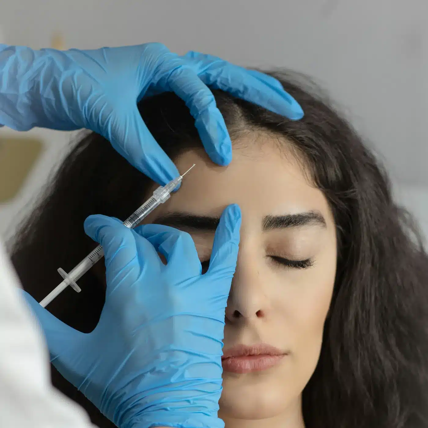 Botox injection into the forehead and frown lines, the treatment offered at Cosmetiq Medicine in Vancouver, WA