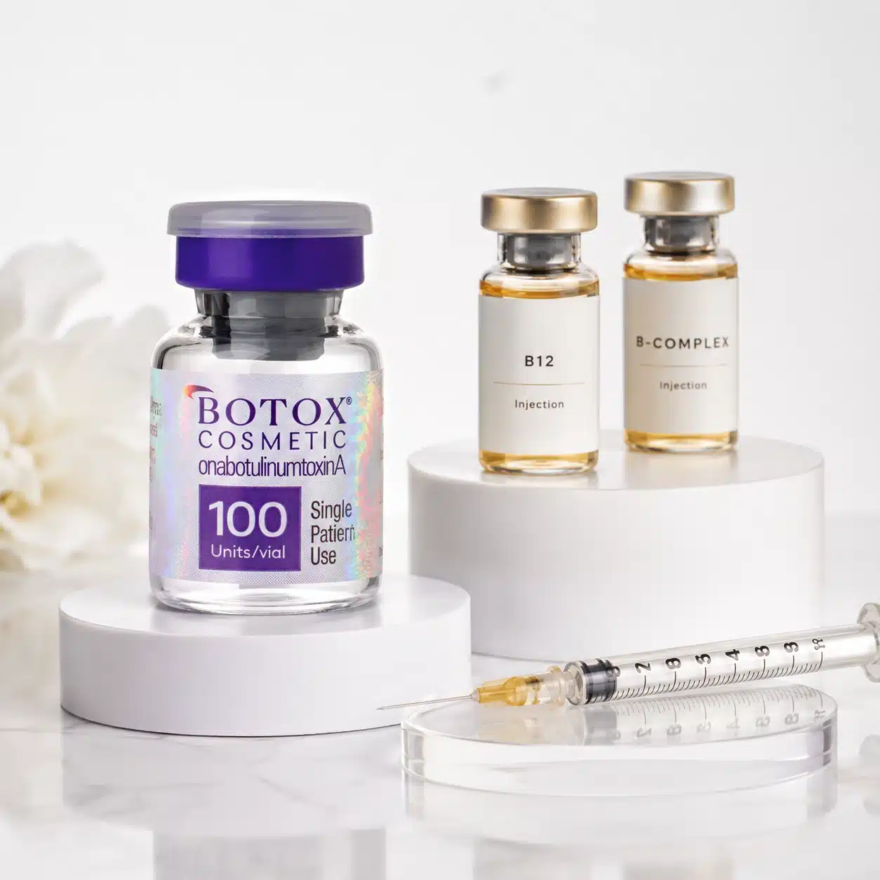 Botox Cosmetic vial with complimentary B12 and B-complex injection vials — Botox specials at Cosmetiq Medicine in Portland, OR and Vancouver, WA