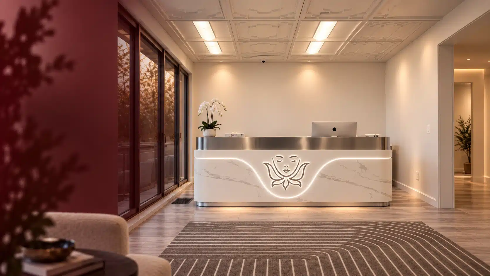 Cosmetiq Medicine med spa reception desk with illuminated logo, serving clients in Portland and Vancouver, WA