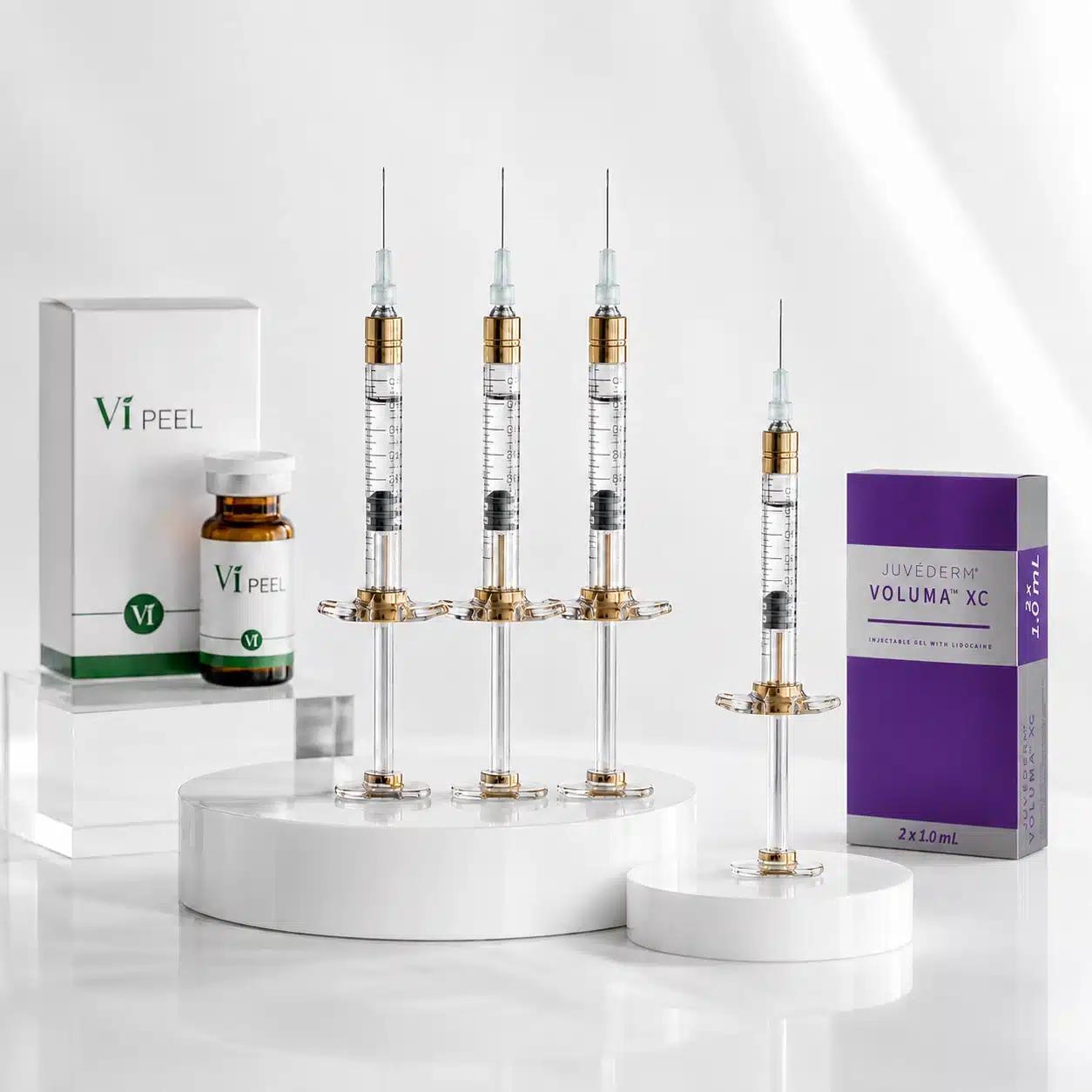 Three dermal filler syringes with a free fourth syringe, VI Peel kit and Juvederm Voluma XC — dermal filler special with free VI Peel at Cosmetiq Medicine, Portland and Vancouver, WA
