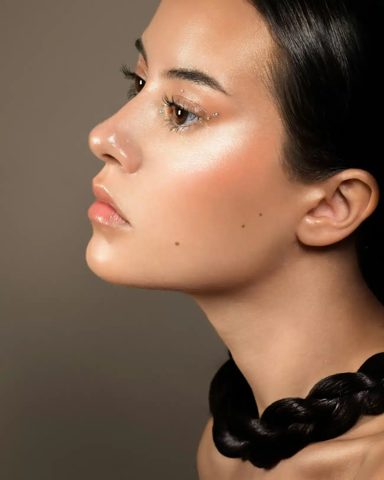 Woman in profile with smooth, glowing skin, representing skin and injectable care at Cosmetiq Medicine in Vancouver, WA