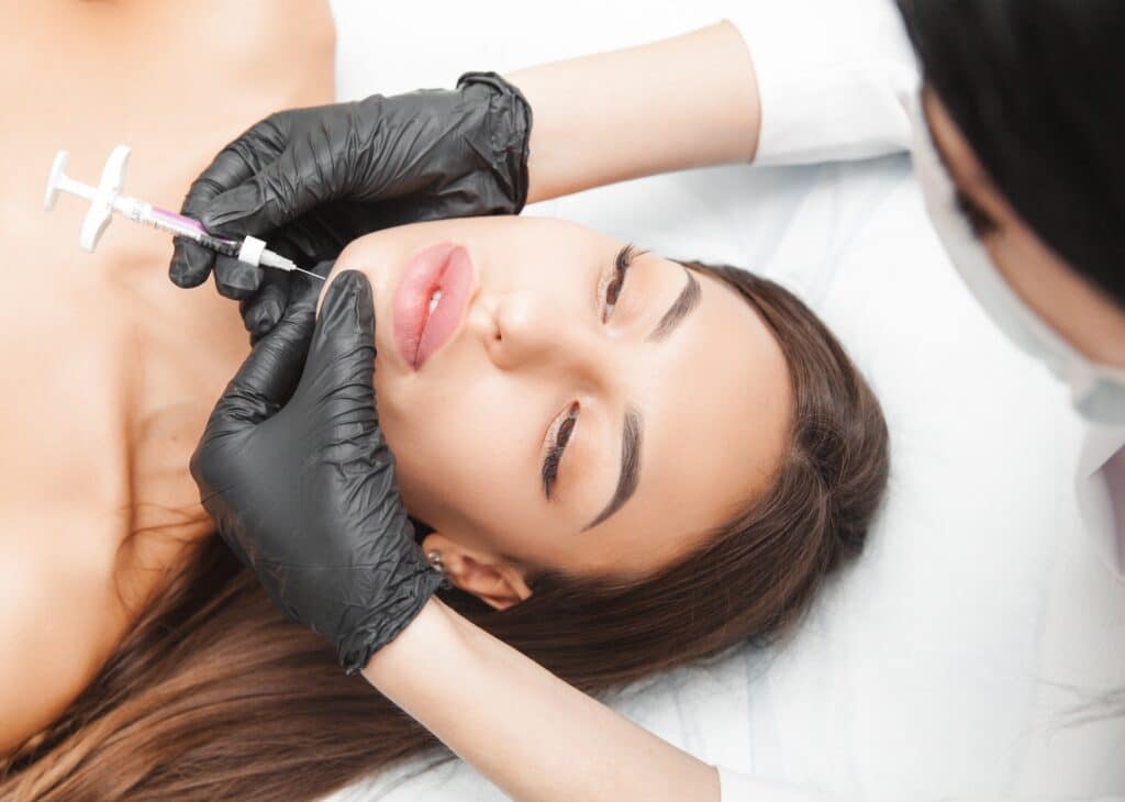Kybella injection beneath the chin to reduce submental fullness before skin tightening at Cosmetiq Medicine in Portland, OR